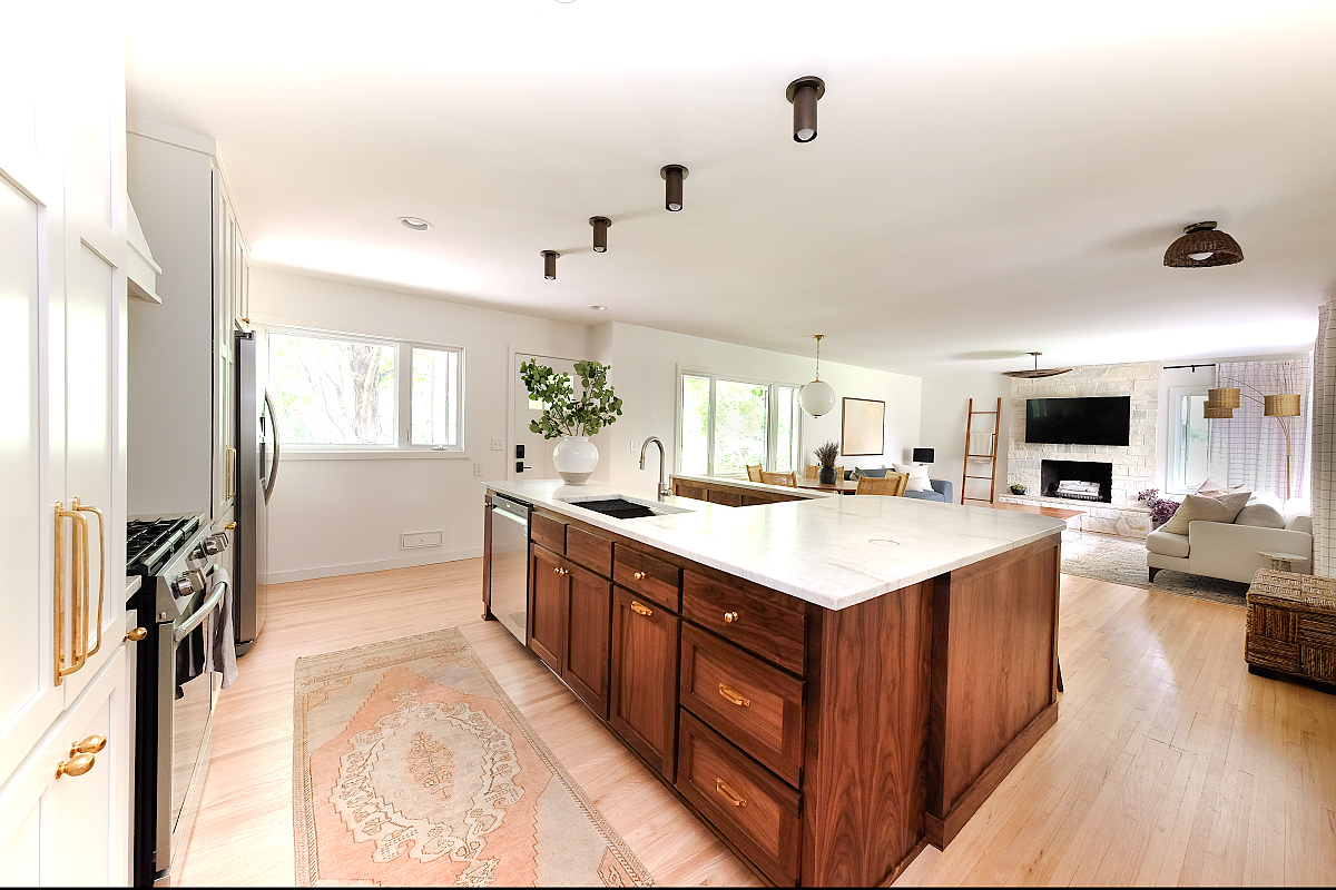Kitchen open to dining and living areas